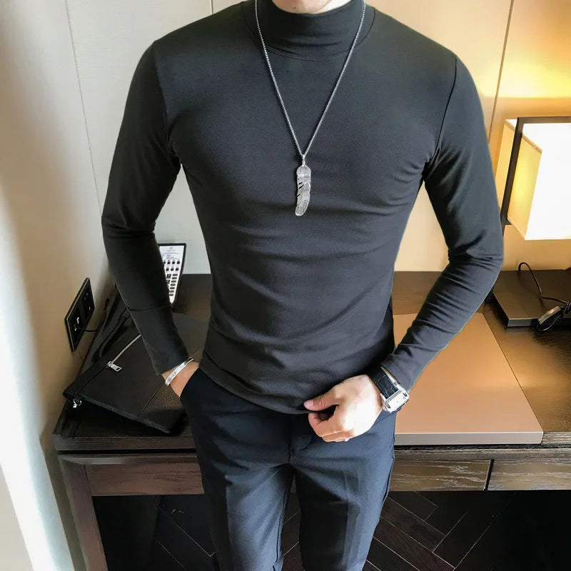 Men's turtleneck long sleeve shirt in charcoal gray - slim fit high elastic cotton pullover, front three-quarter view styled on model with dark pants