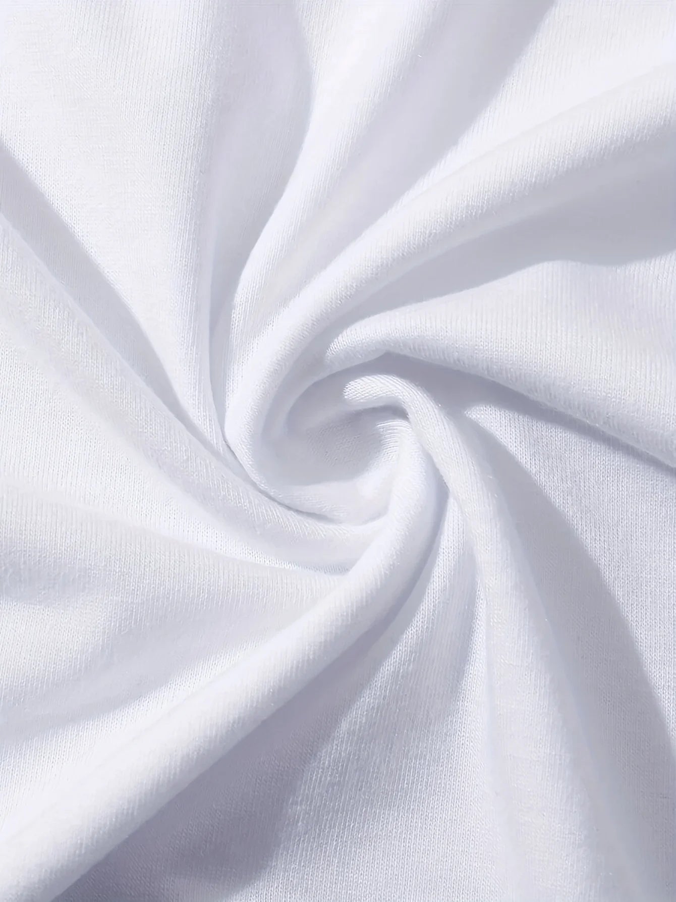 Close-up of soft white polyester fabric texture on women's Paris graphic tee, lightweight and breathable material