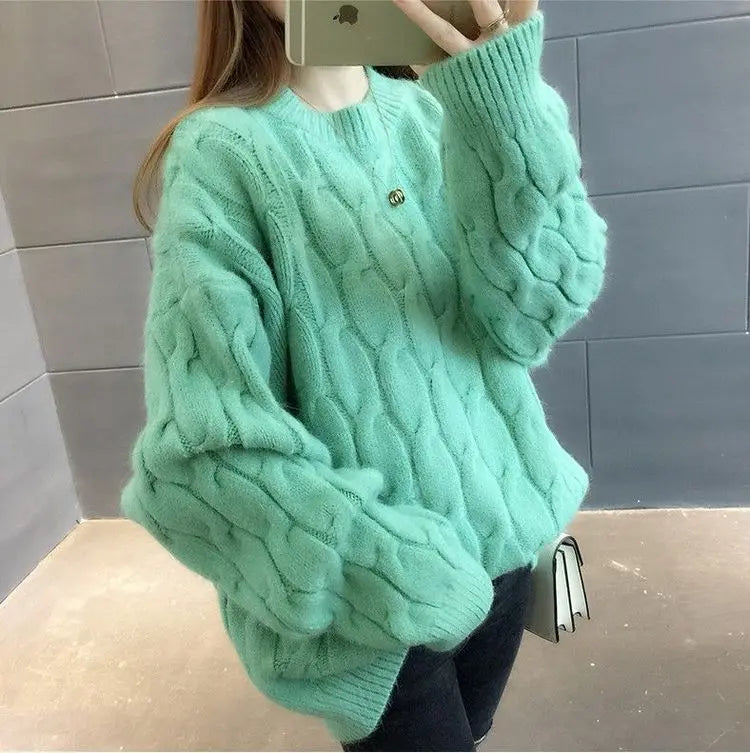 Women's mint green twisted cable knit cashmere sweater side view loose fit pullover