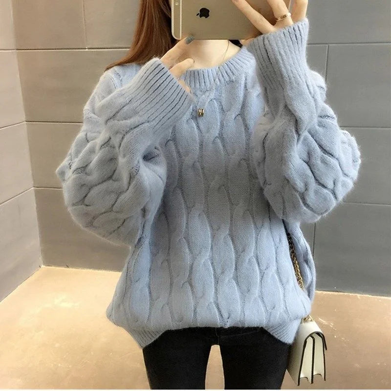 Women's light blue twisted cable knit cashmere sweater back view loose fit pullover