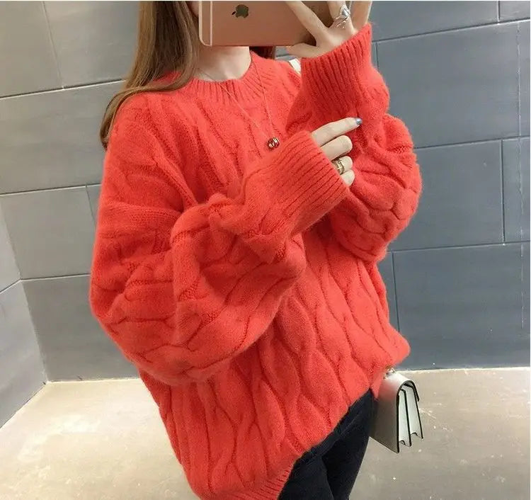 Women's coral red twisted cable knit cashmere sweater side view loose fit pullover