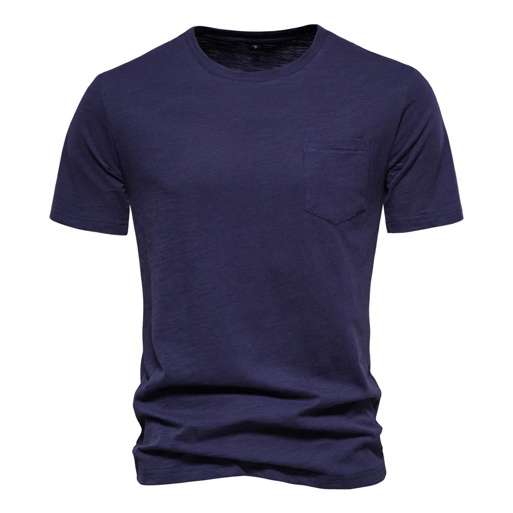 Men's 100% cotton O-neck t-shirt in navy blue with chest pocket and short sleeves, front view