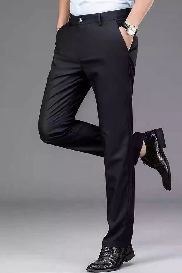 Men's 4-way stretch dress pants, quick dry, black, dynamic pose showing flexibility