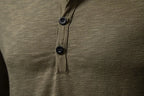 Men's long sleeve cotton Henley shirt, olive, Henley neck button placket detail, close-up