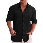 Men's cotton linen shirt in black, long sleeve with rolled-up cuffs, styled on model front view