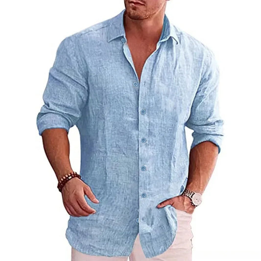Men's cotton linen shirt in light blue, long sleeve with rolled-up cuffs, styled on model front view