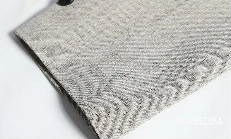 Men's slim fit blazer, beige, sleeve cuff and button detail, close-up