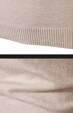 Men's oversized mock neck sweater in beige, close-up of ribbed hem and knit texture detail