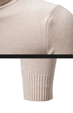 Men's oversized mock neck sweater in beige, close-up detail of shoulder seam and ribbed cuff
