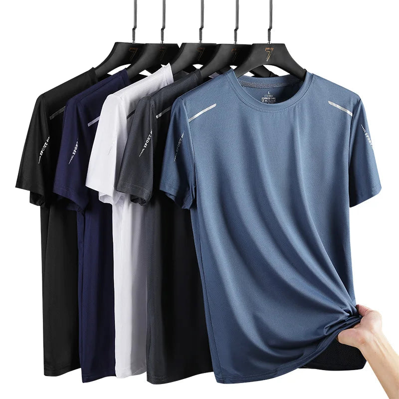 Men's quick dry athletic t-shirt collection displayed on hangers showing slate blue, navy, black, gray and white color options