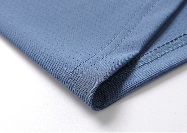 Close-up of athletic t-shirt sleeve hem with ribbed cuff construction detail