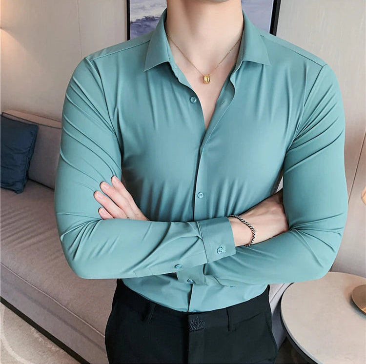 Men's slim fit dress shirt in teal broadcloth long sleeve business shirt - front view arms crossed