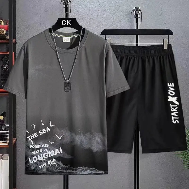 Men's summer 2-piece set with gray graphic t-shirt and black shorts - short sleeve casual outfit with mountain print, front view