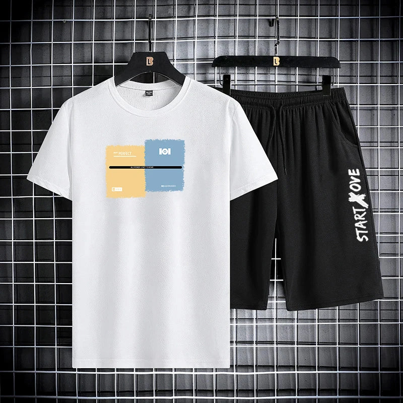 Men's summer 2-piece set with white color block graphic t-shirt and black matching shorts, front view
