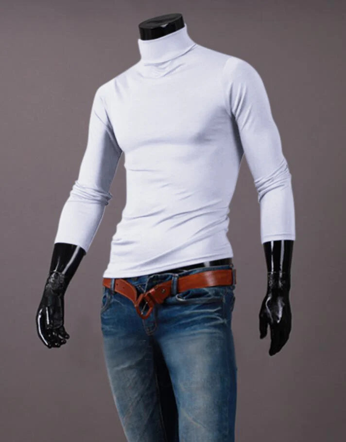 Men's thermal base layer turtleneck long sleeve top, white, styled on mannequin with jeans and belt, front view