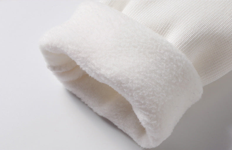 Close-up of soft fleece lining interior on men's white turtleneck pullover sweater - warm inner fabric detail