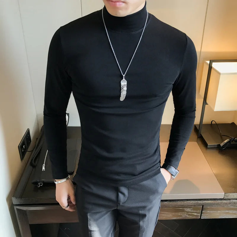 Men's turtleneck long sleeve shirt in black - slim fit high elastic cotton pullover, front view styled on model with gray pants