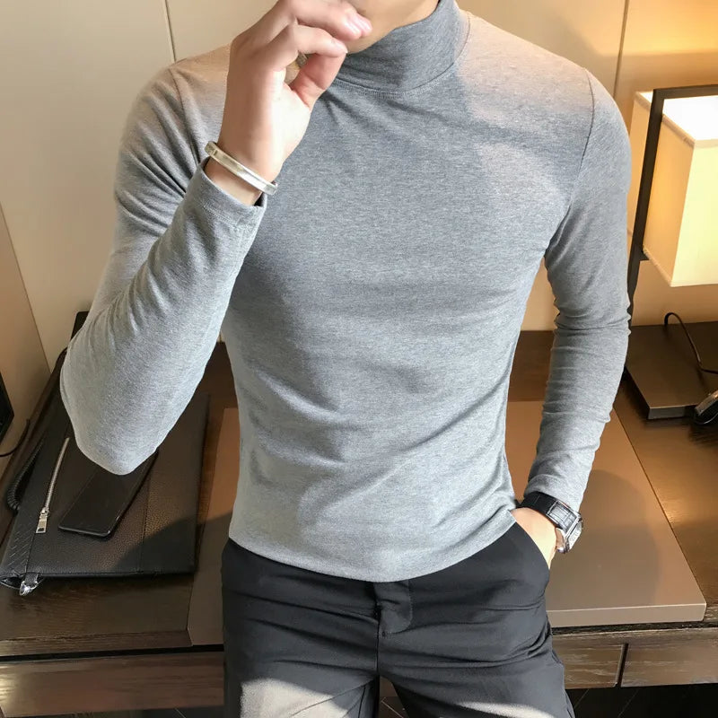 Men's turtleneck long sleeve shirt in gray - slim fit high elastic cotton pullover, front view styled on model with dark pants