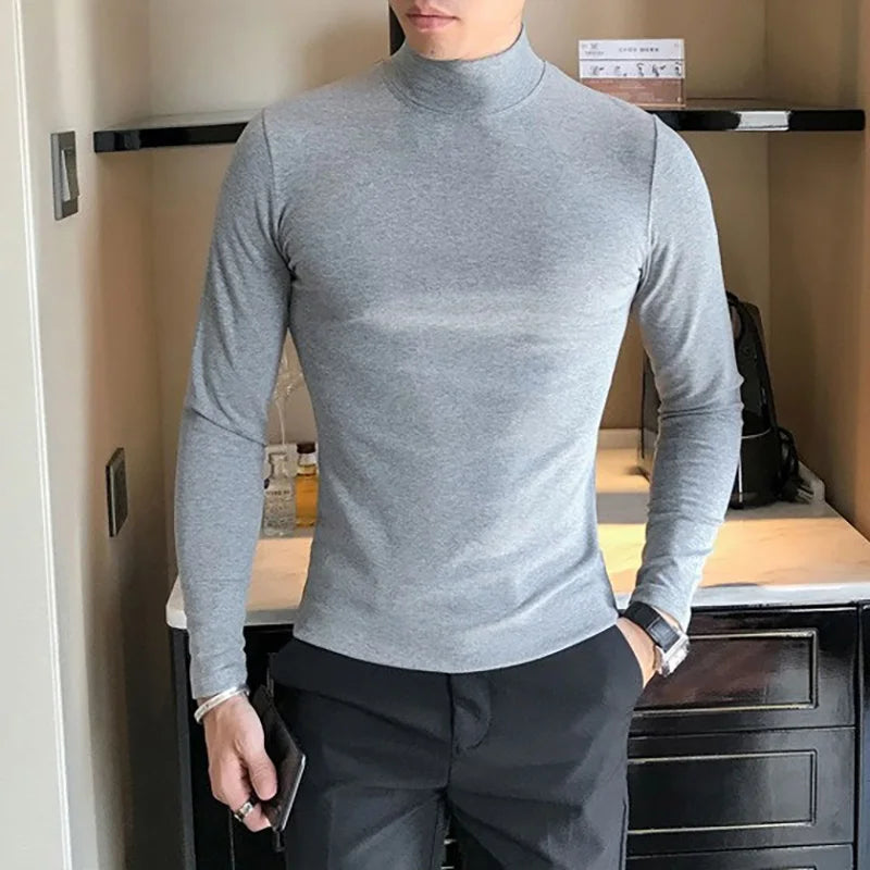 Men's turtleneck long sleeve shirt in light gray - slim fit high elastic cotton pullover, front view styled on model with dark pants