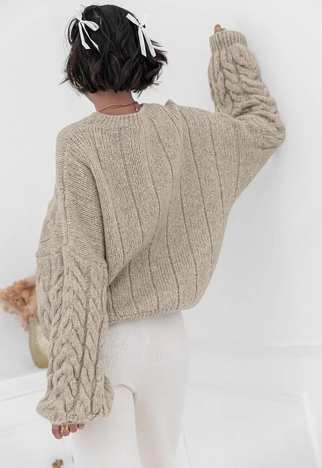 Women's cream O-neck knitted sweater back view cable knit pattern loose fit winter 2025