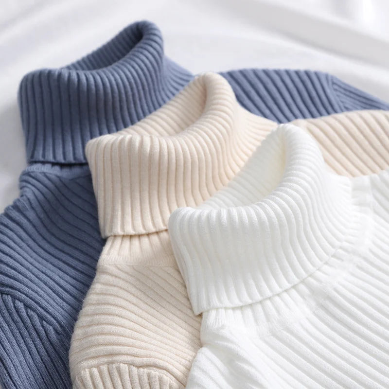 Women's cashmere blend turtleneck sweaters in blue and white ribbed knit, collage closeup view