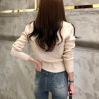Damen-Strickjacke in Creme mit geripptem Saum – langärmelige Strickjacke mit Knopfleiste, Rückansicht