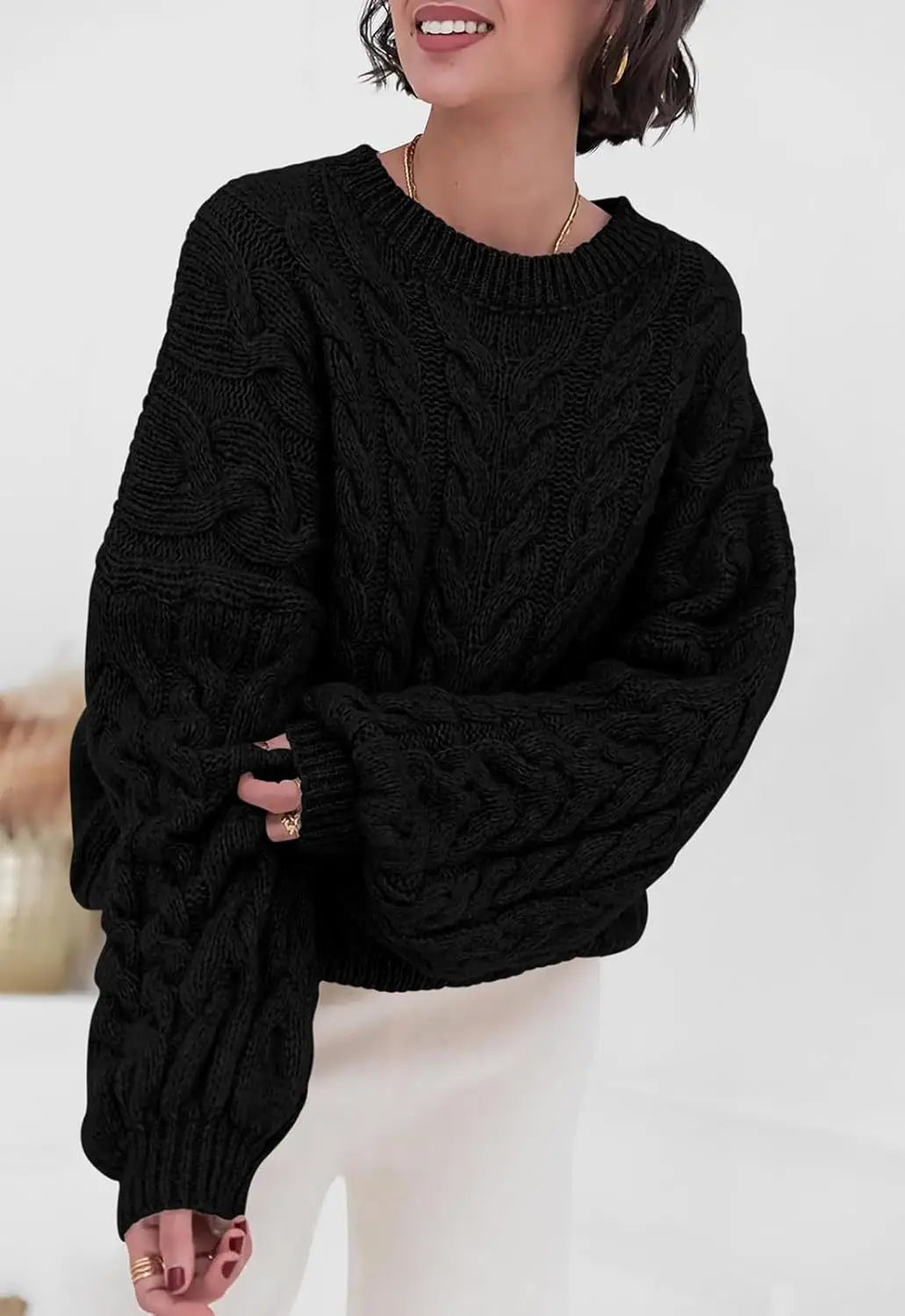 Women's loose fit O-neck sweater in black cable knit high elastic pullover - front view