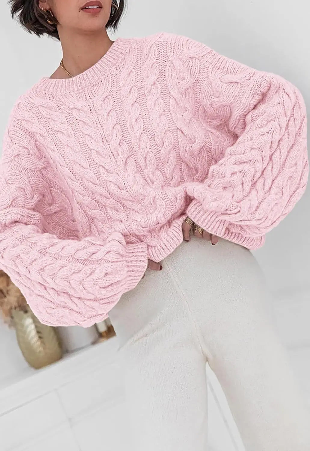 Women's loose fit O-neck sweater in pink cable knit high elastic pullover - front view