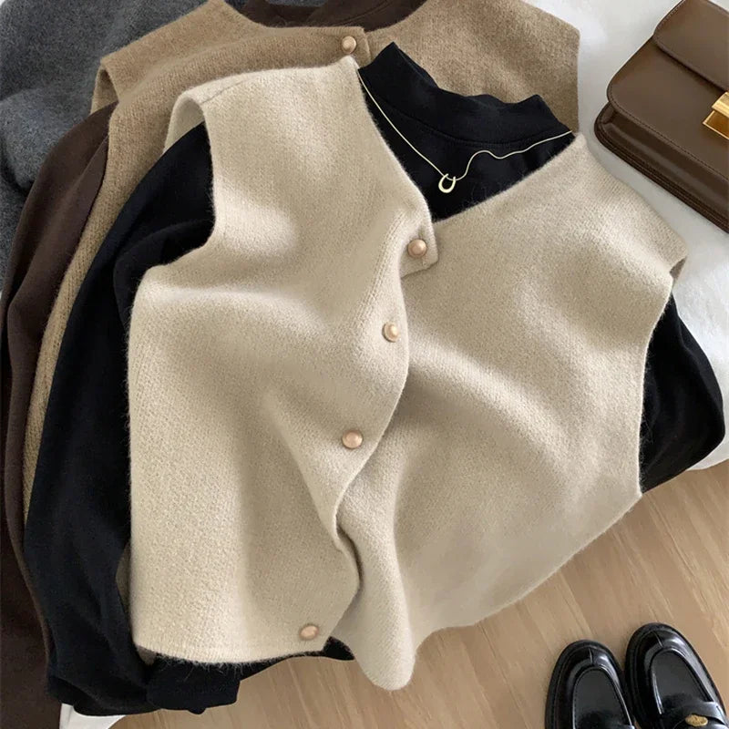 Women's sleeveless knit cardigan with O-neck and button closure, beige, lifestyle flat lay