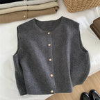 Women's sleeveless knit cardigan with O-neck and button closure, dark gray, front view