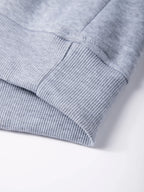 Sweat-shirt à col rond pour homme, couleur gris clair, détail de l’ourlet côtelé