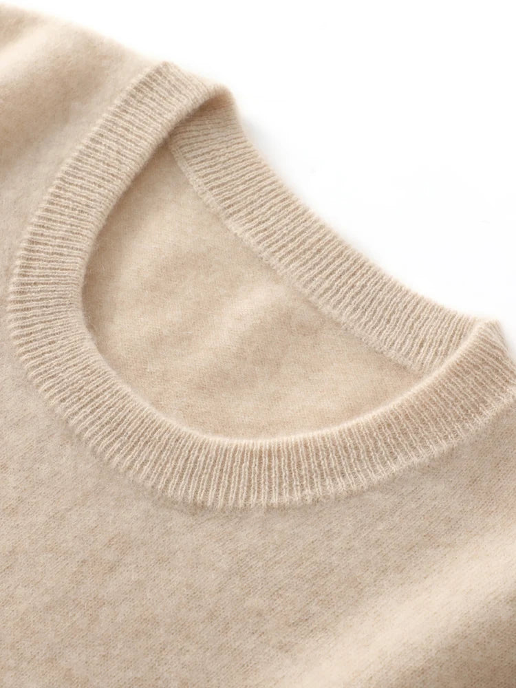Men's merino wool crew neck sweater in beige, close-up of ribbed crew neckline