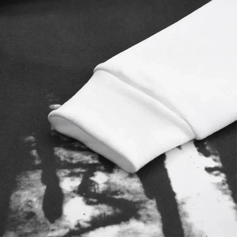 Men's graphic tracksuit set, close-up of ribbed cuff fabric