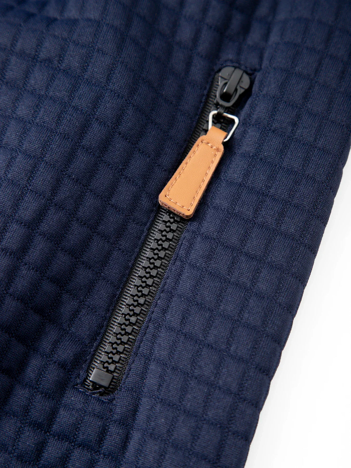 Men's waffle knit pullover hoodie, close-up of zipper pull detail