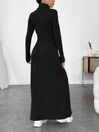 Women's black ribbed turtleneck maxi dress, back view