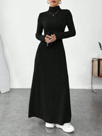 Women's black ribbed turtleneck maxi dress, front view