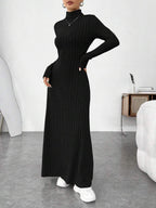 Women's black ribbed turtleneck maxi dress, side view
